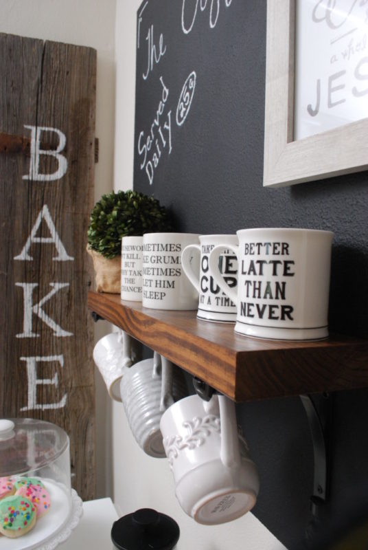 Coffee mug shelf with brackets and hooks