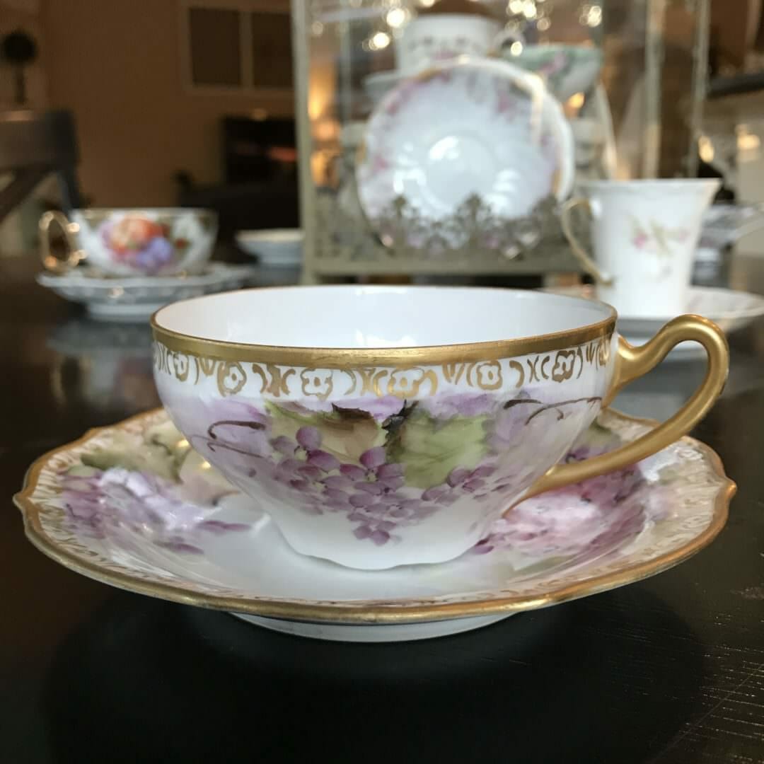 Hand painted vintage teacup and saucer in gold and lilac
