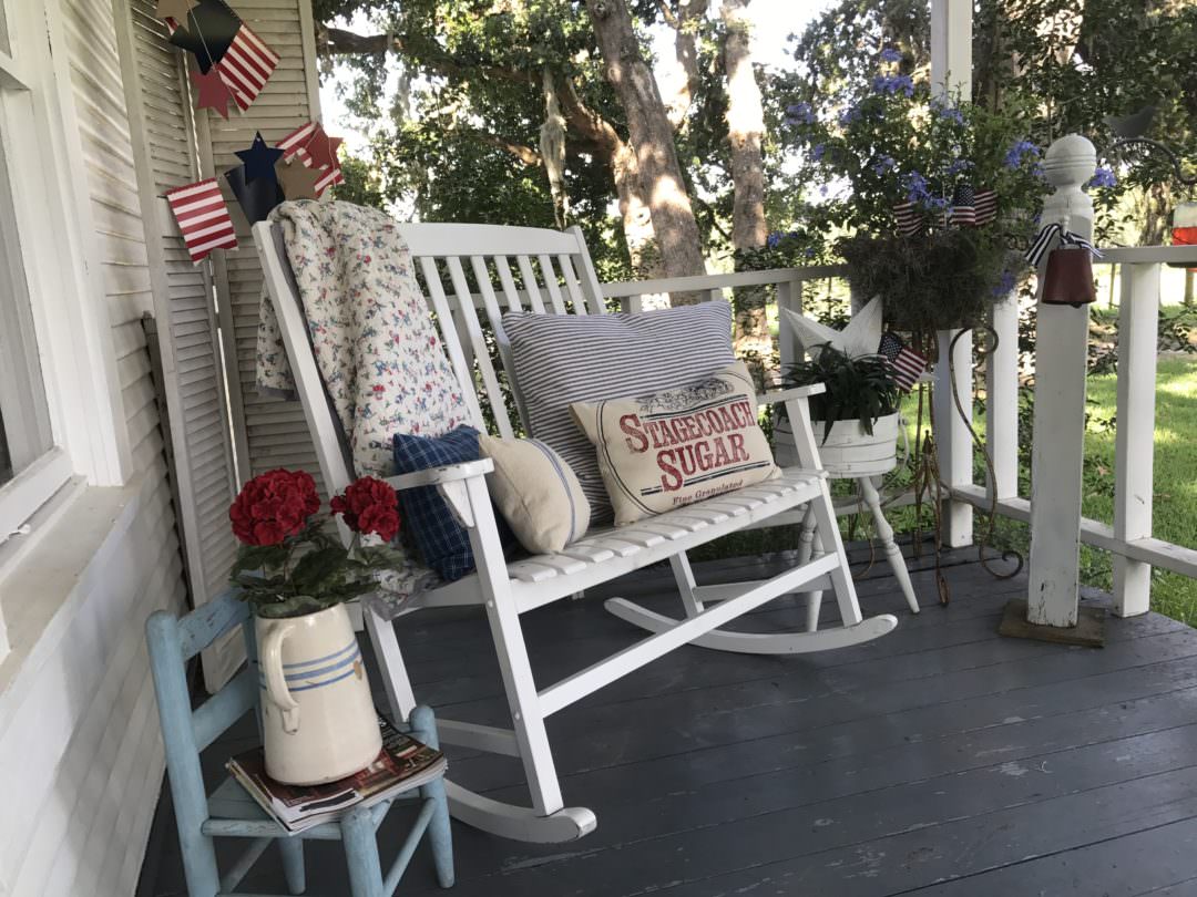 patriotic decor on a farmhouse front porch