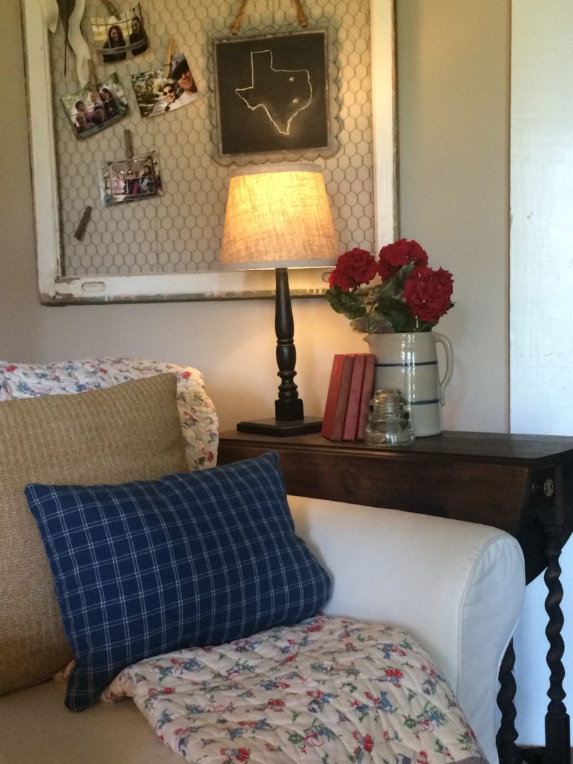 July 4th decor with vintage books, old crock and vintage insulator