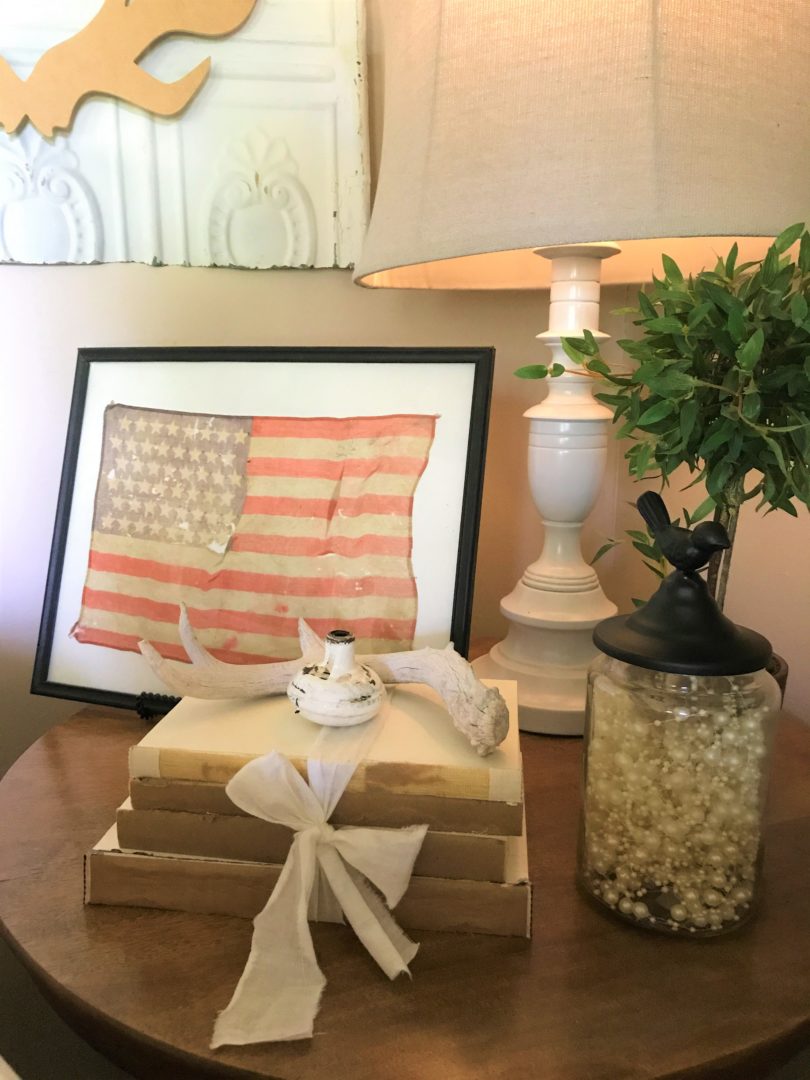 July 4th decor with vintage flag and books