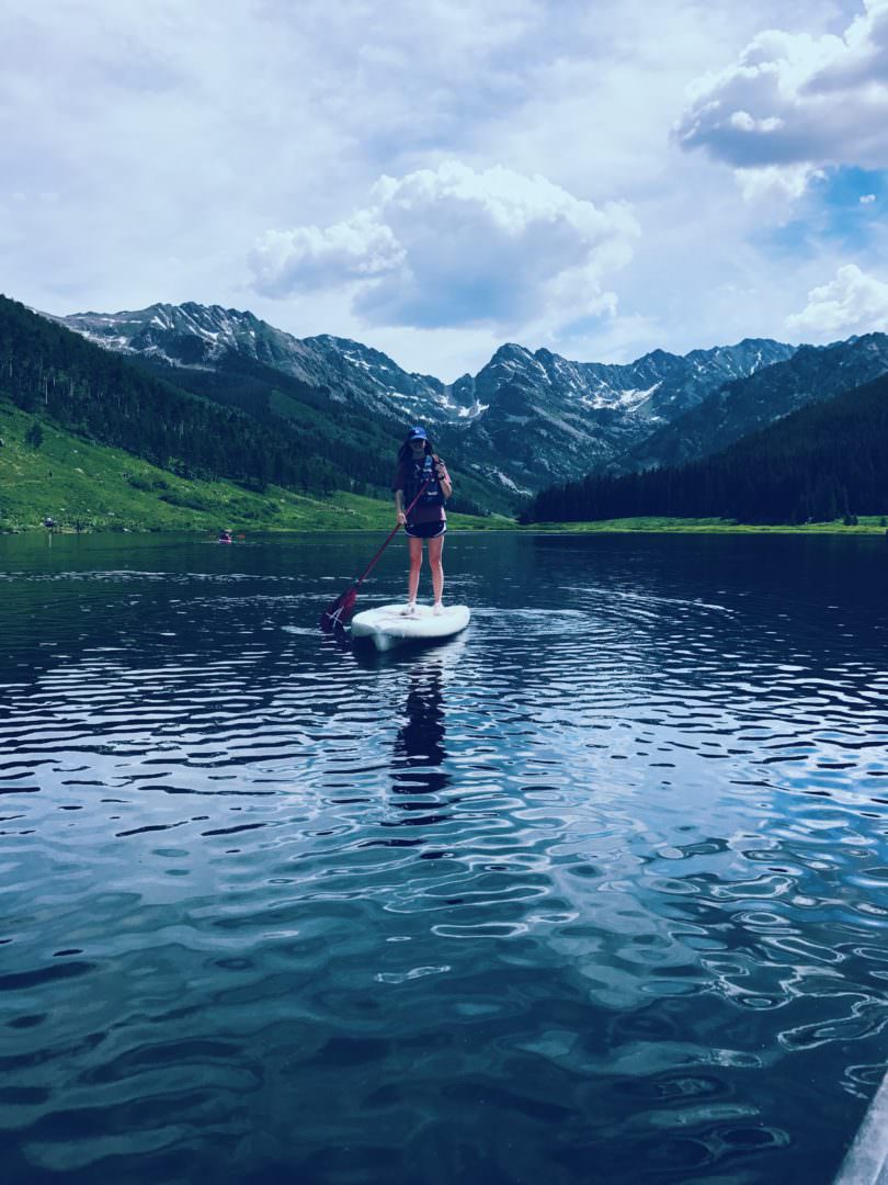 Paddle boarding on Piney Woods Lake in Colorado