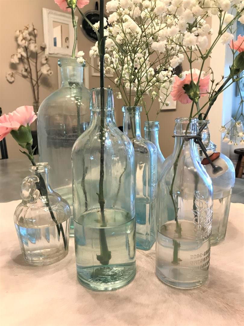 vintage bottles with flowers