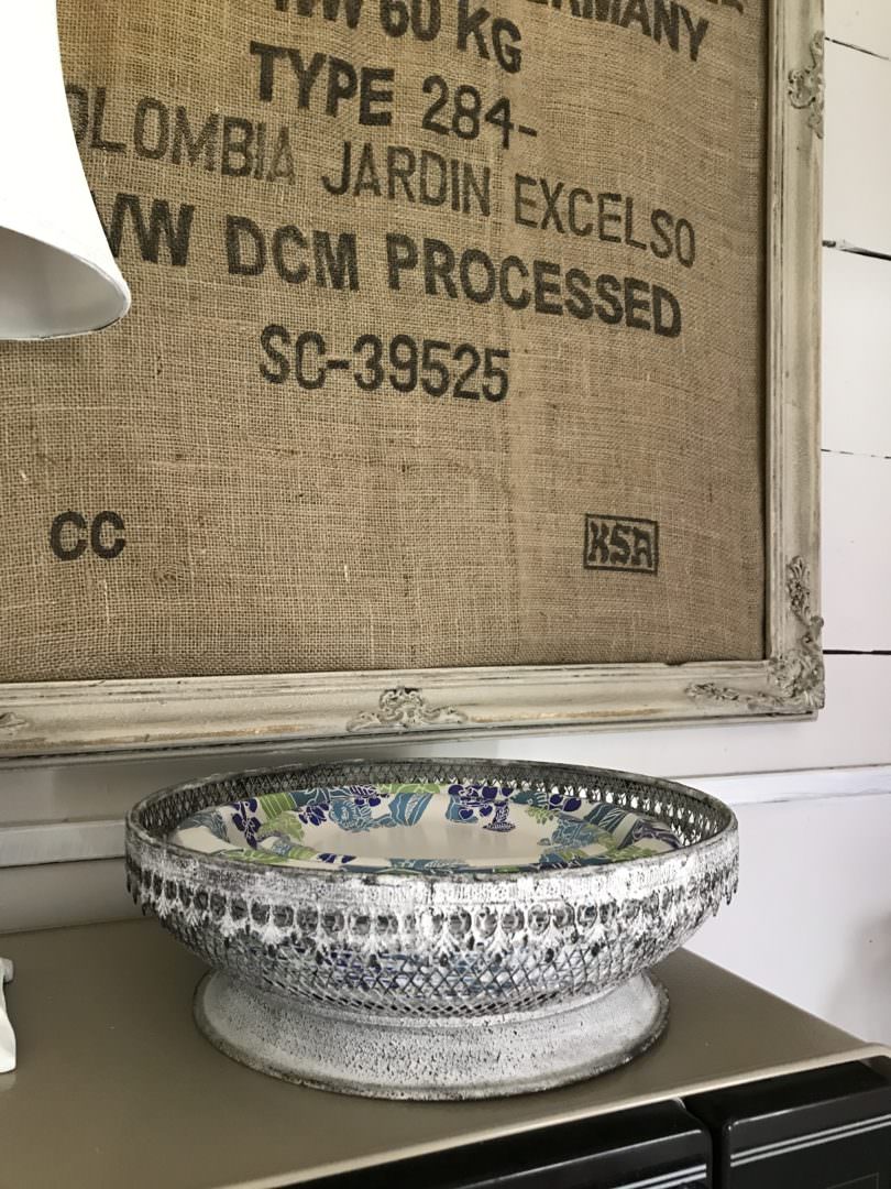 Decorating with farmhouse kitchen details like grain sacks and adding details like wire paper plate holders