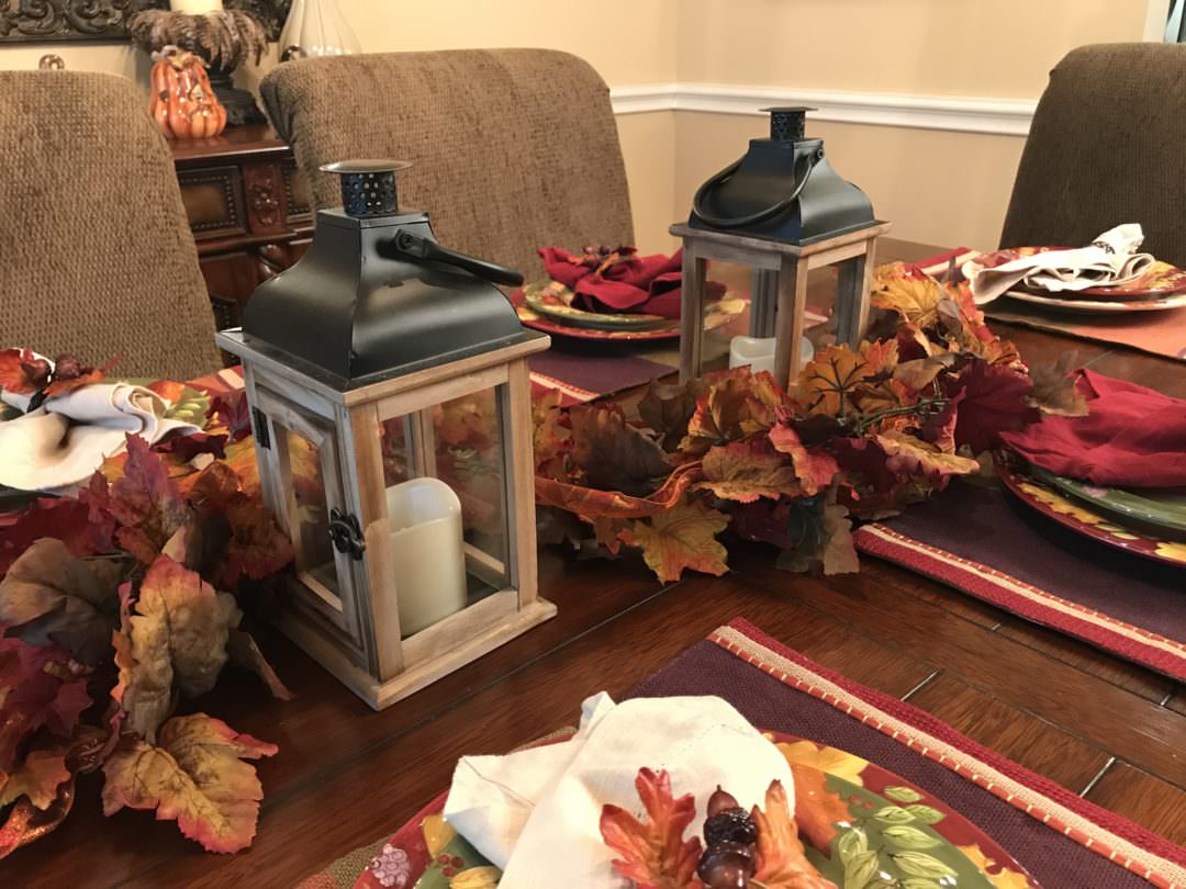 one strand of fall garland used in three different fall centerpiece ideas