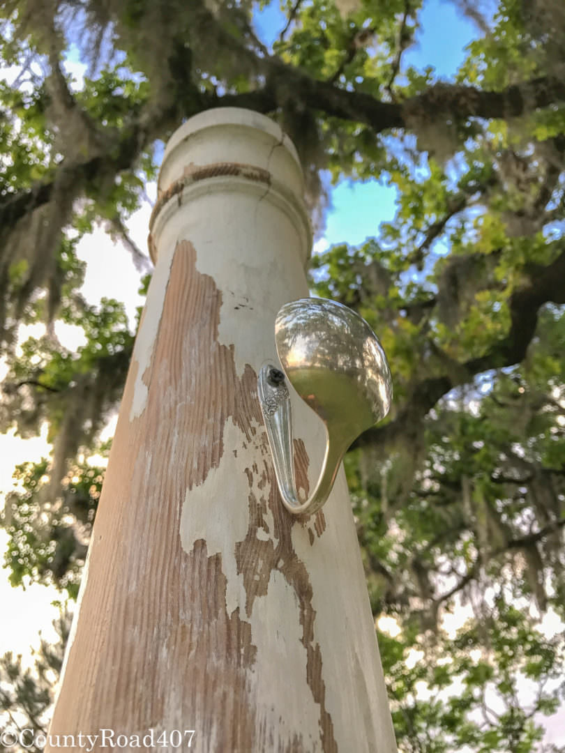 Antique Column repurposed into coat rack by countyroad407.com