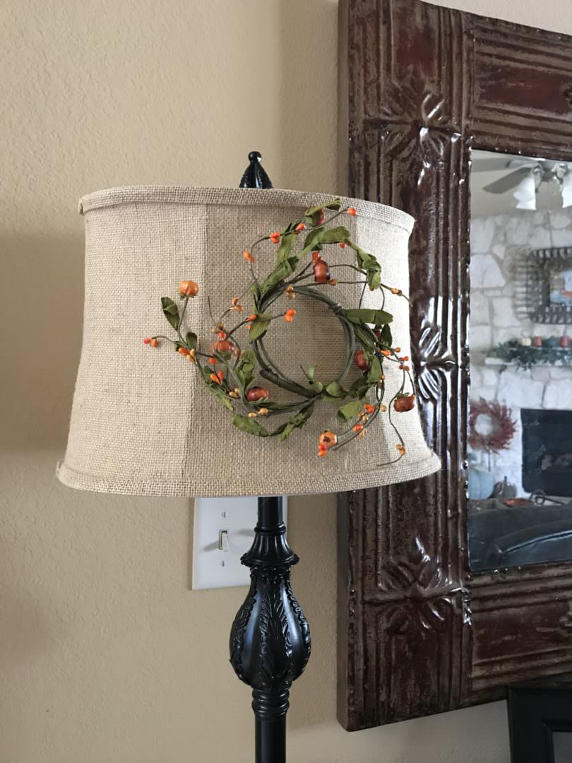 Hang a candle ring on a lamp shade for a touch of fall. Countyroad407.com