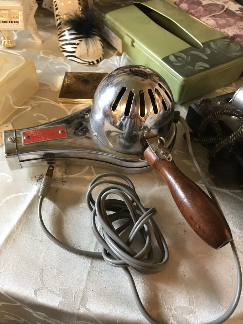 Vintage hair dryer would make cute wall art. Found at the Scarecrow Festival in Chappell Hill TX