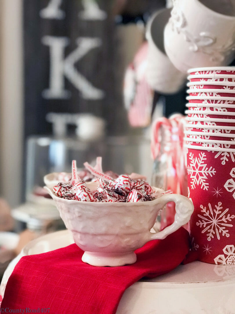 Use vintage creamer and sugar bowls for a fun look on a Christmas Cocoa Bar by CountyRoad40.com