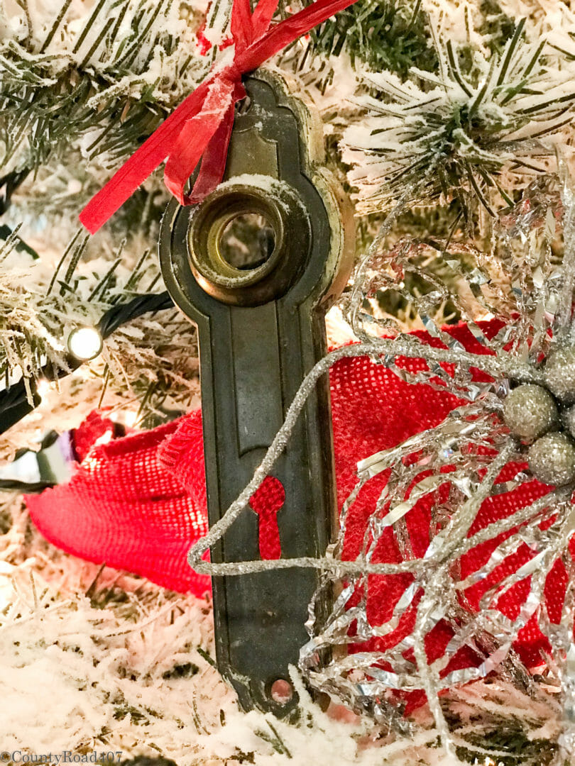 Use vintage door knob plates for unusual Christmas tree ornaments. CountyRoad407.com