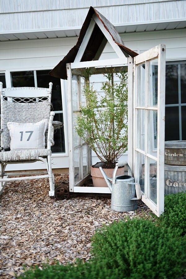 a Greenhouse is a perfect way to repurpose old windows. Like this one found on Craftsmandrive.com - CountyRoad407.com