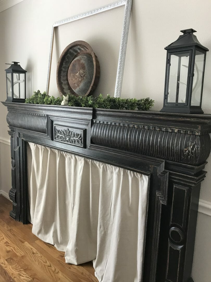 The no sew dro cloth curtain under new mantel to hide chair railing by countyroad407.com