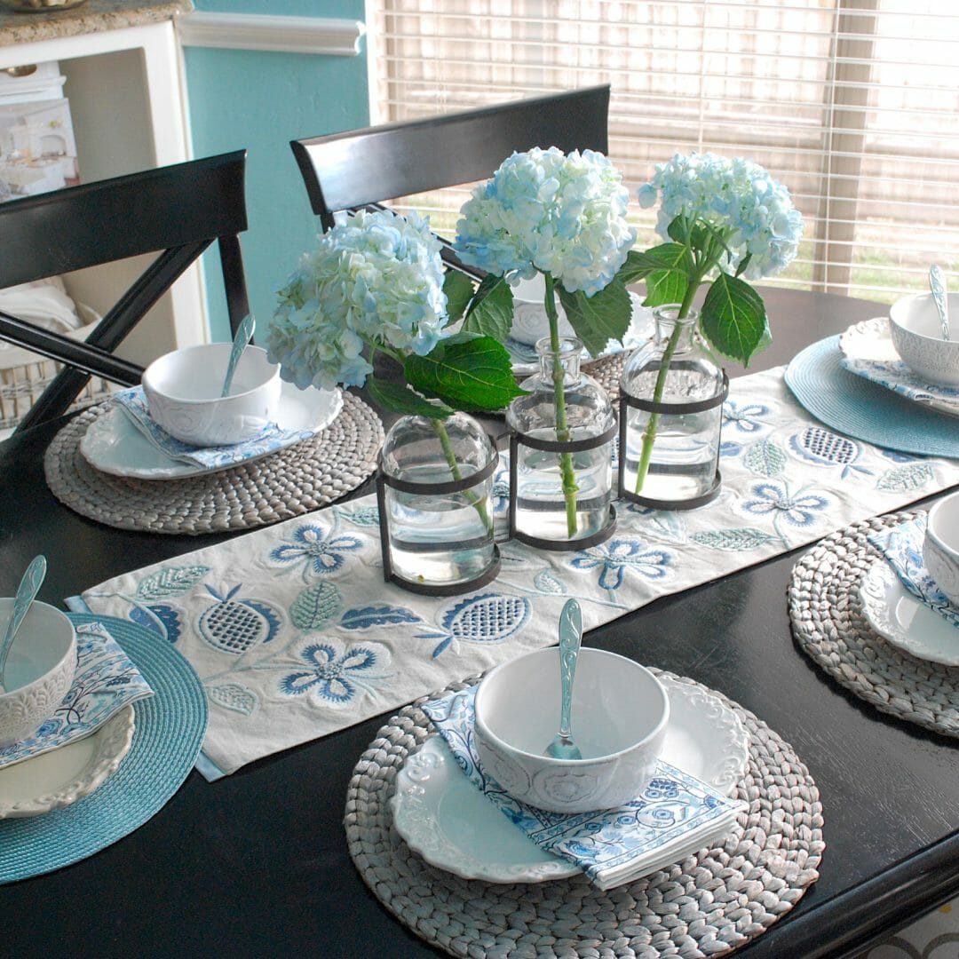 Ushering in summer with cool blue color in a tablescape by countyroad407.com