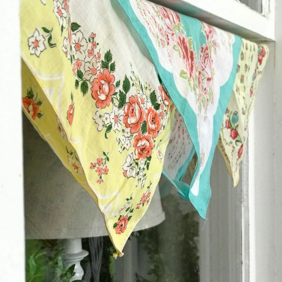 Vintage handkerchiefs make cute outdoor valances by Countyroad407.com