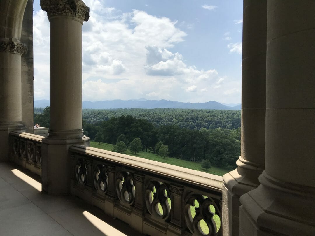 Biltmore Estate balcony view of the 8000 acres and Chihuly exhibit by CountyRoad407.com