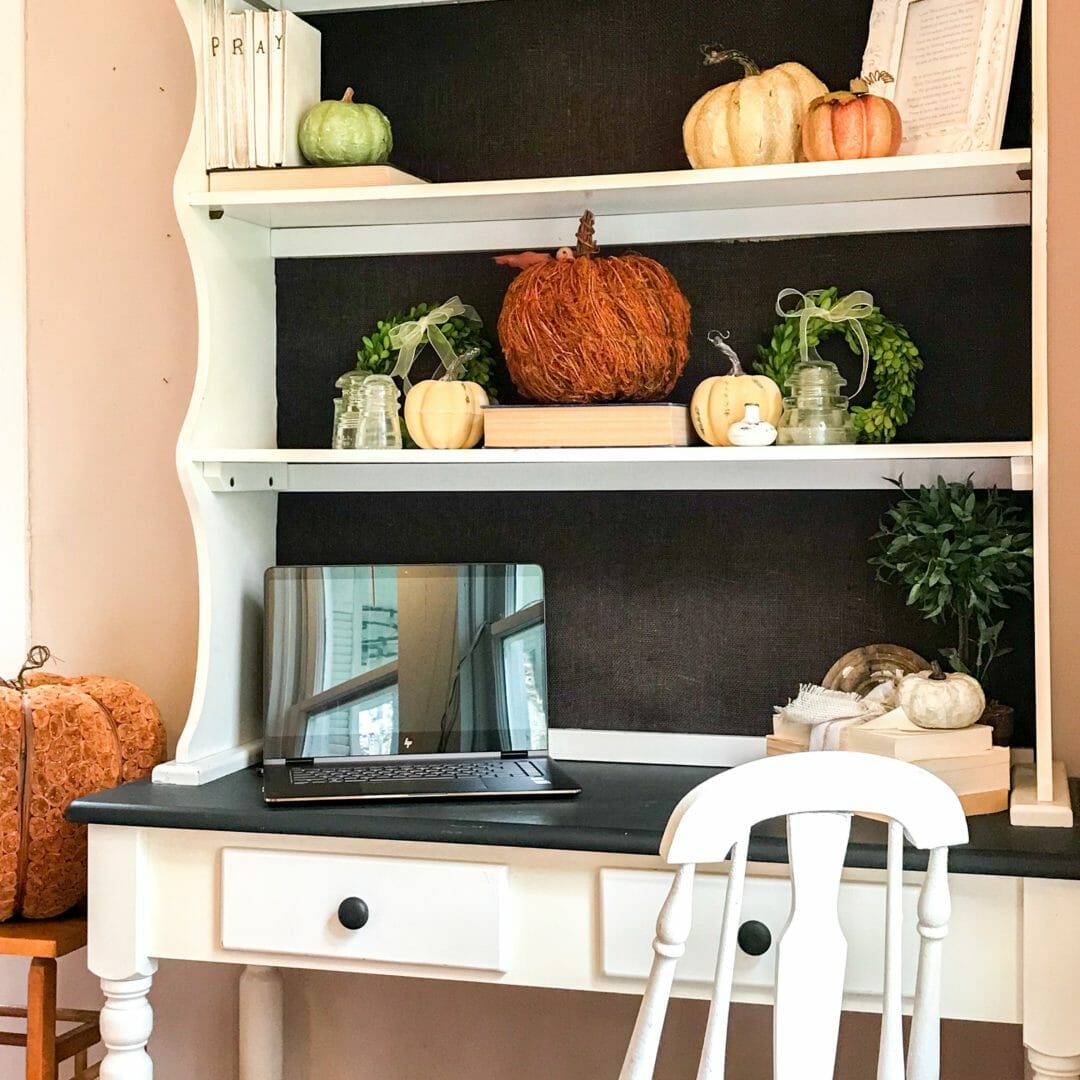 Repurposed dining hutch used as a desk in te fall farmhouse tour by CountyRoad407.com
