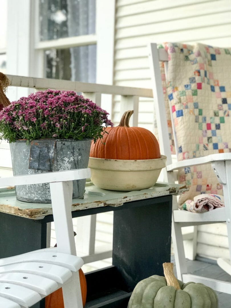 A farmhouse fall front porch by CountyRoad407.com