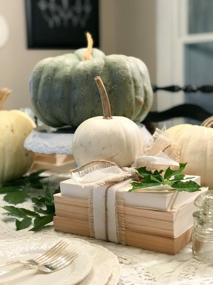 pumpkins and deconstructed book for a fall tablescape by CountyRoad407.com