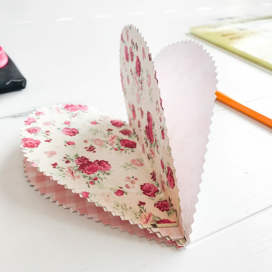 Hanging Paper heart Valentine craft for 10 on the 10th by CountyRoad407.com