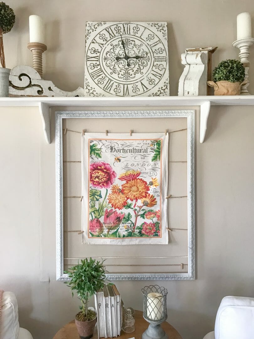 Spring ideas for a farmhouse living room by CountyRoad407.com #springdecor #springartwork #springlivingroom #springdecorideas #springideas