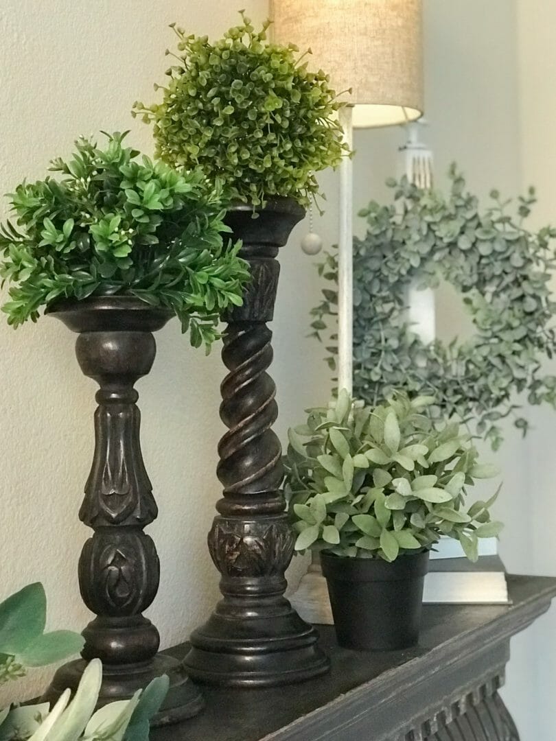 How I use greenery balls in my decor. By CountyRoad407.com #fauxgreenery #topiaryballs #greenery #springdecor #springdecorating #fauxplants #decor