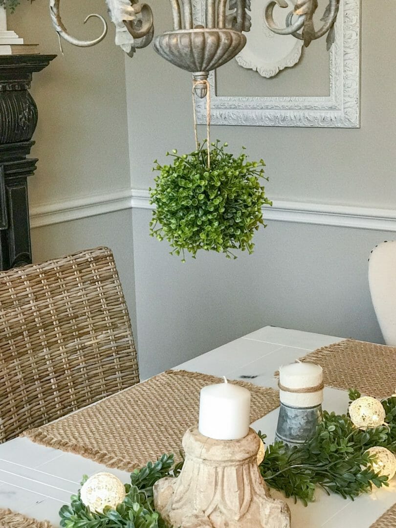 How I use greenery balls in my decor. By CountyRoad407.com #fauxgreenery #topiaryballs #greenery #springdecor #springdecorating #fauxplants #decor