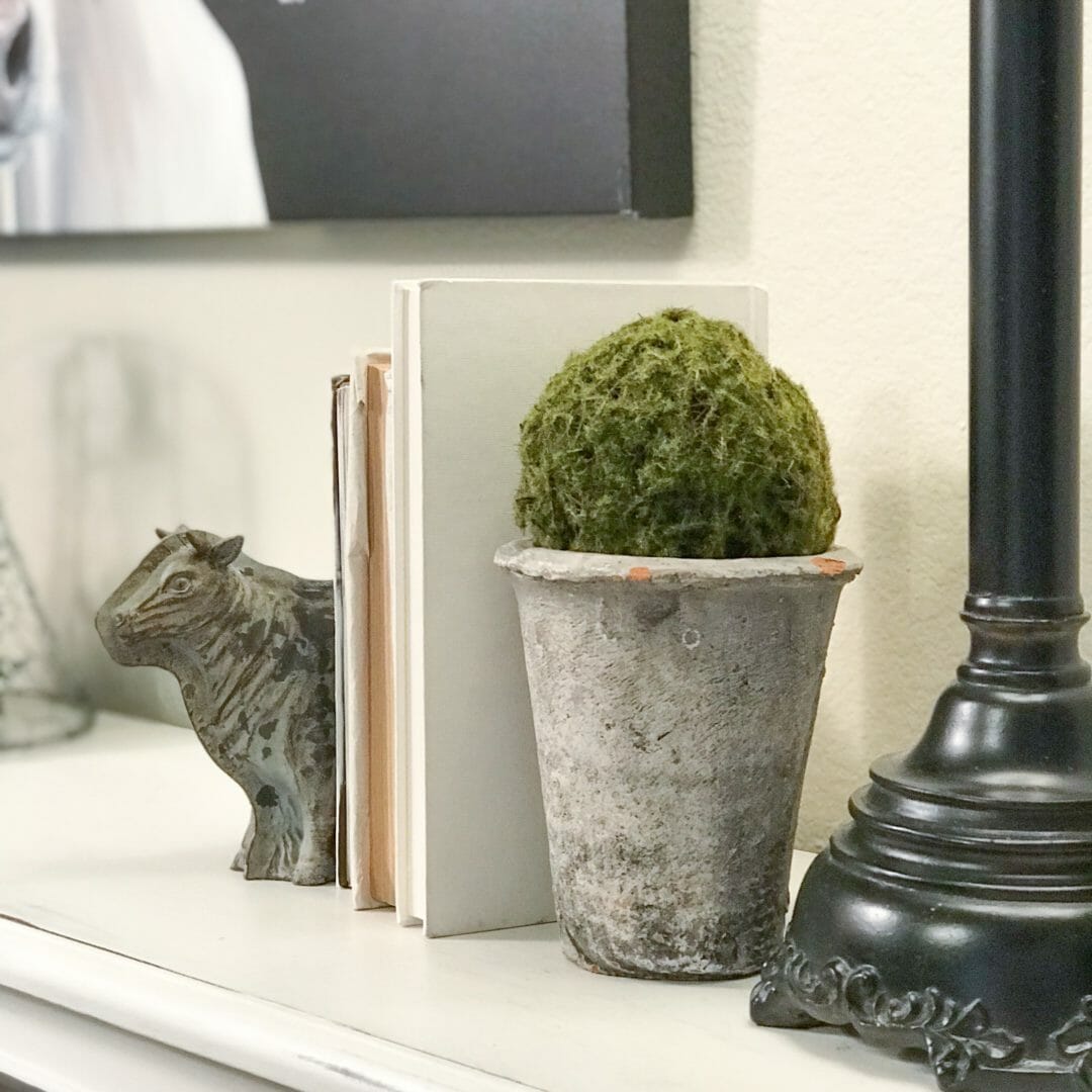 How I use greenery balls in my decor. By CountyRoad407.com #fauxgreenery #topiaryballs #greenery #springdecor #springdecorating #fauxplants #decor