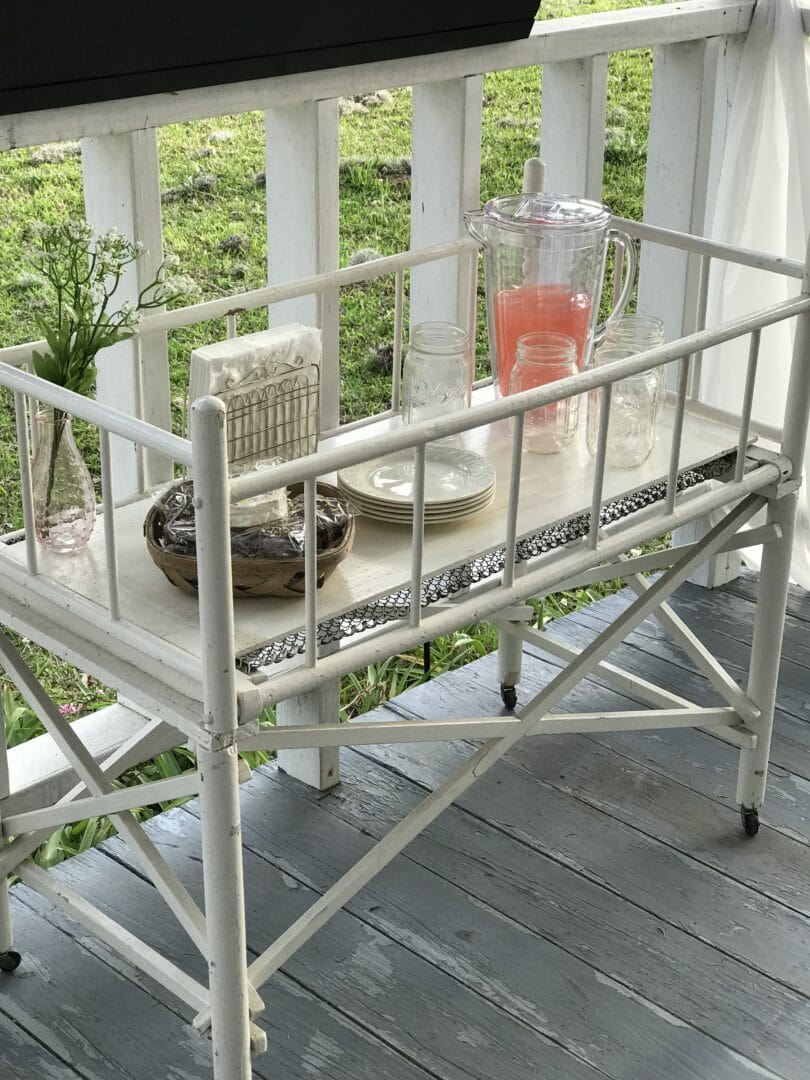 Spring farmhouse porch tour with a blog hop by CountyRoad407.com #springtour #springporch #springporchideas #springporchdecor #springfarmhouseporch #farmhousestyle #farmhouseporch #farmhouseporchideas #springfarmhouseideas