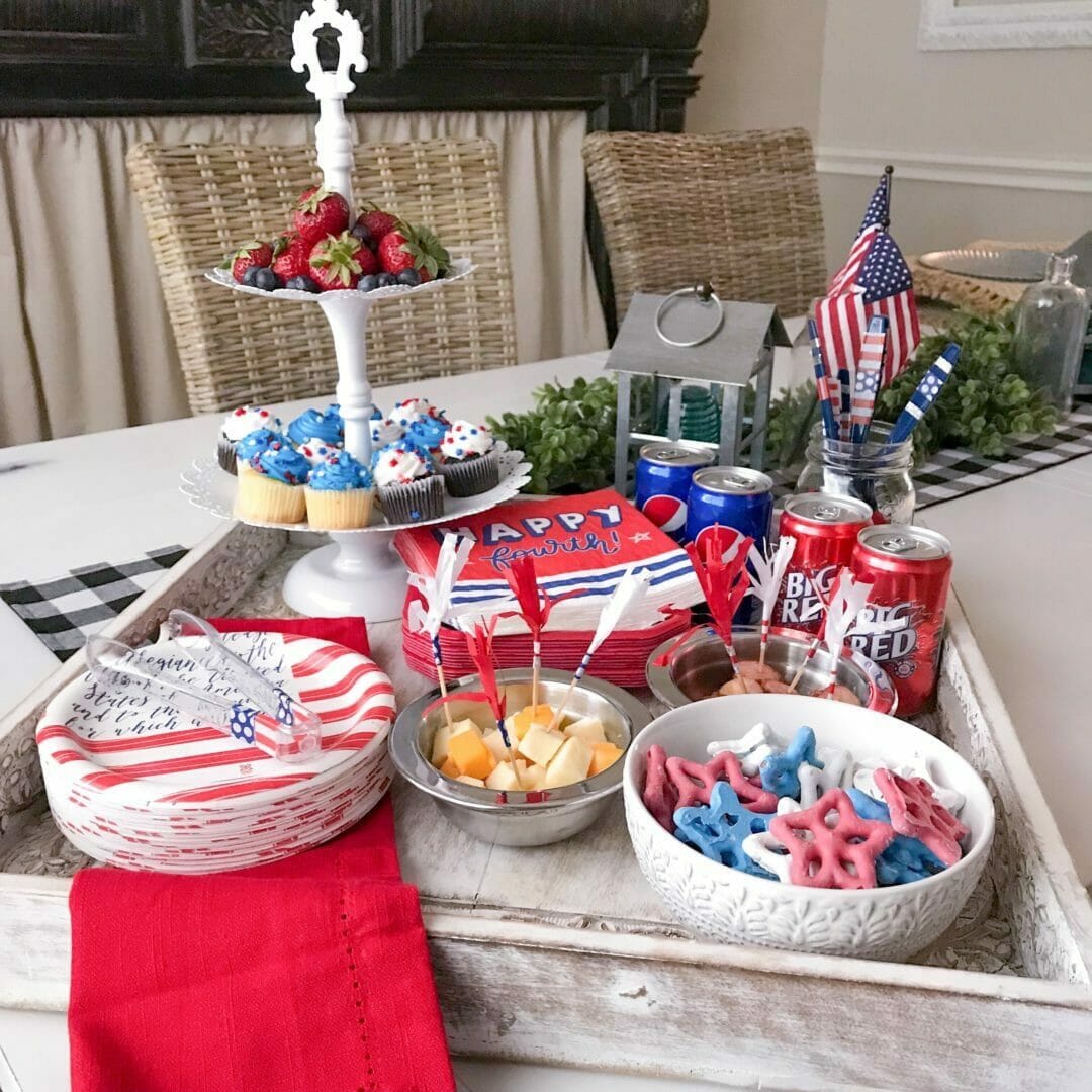 Patriotic Plasticware in a tray on a table with dessert tray