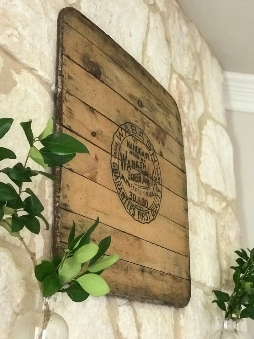 An antique sign for a new summer mantel by countyroad407.com #antiquesign #manteldecor #summermantelidea #mantelartwork #mantelideas #countyroad407