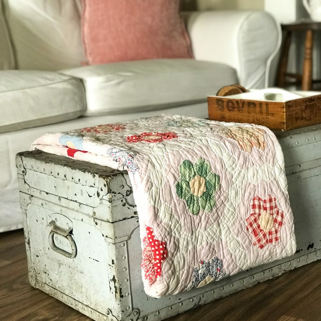 Antique trunk as our new coffee table by CountyRoad407.com #vintagetrunks #quilts #coffetableideas #countyroad407
