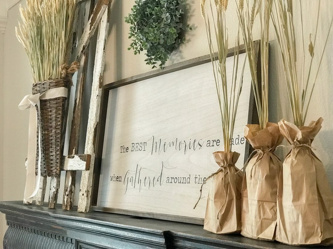 art work, bottles with gate and basket of wheat