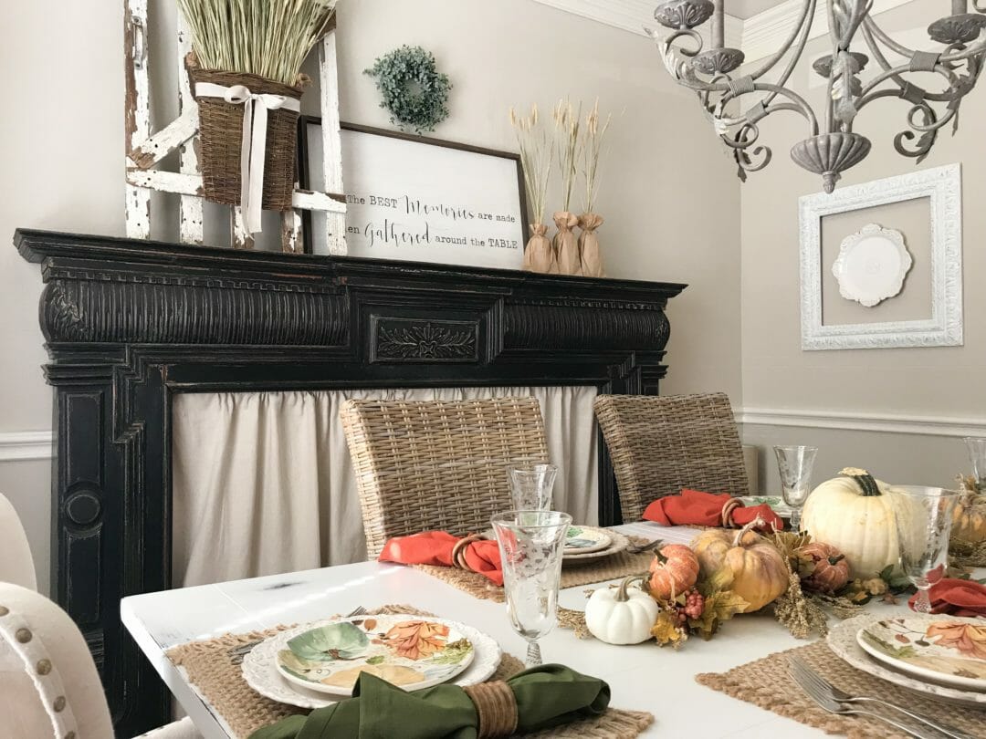 dining rooom with mantel and fall decor