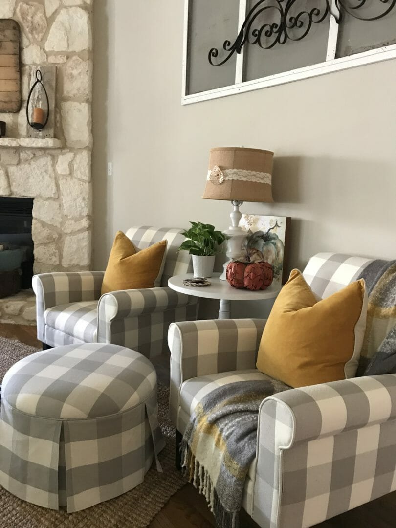 gray buffalo check chairs with table and fall accessories