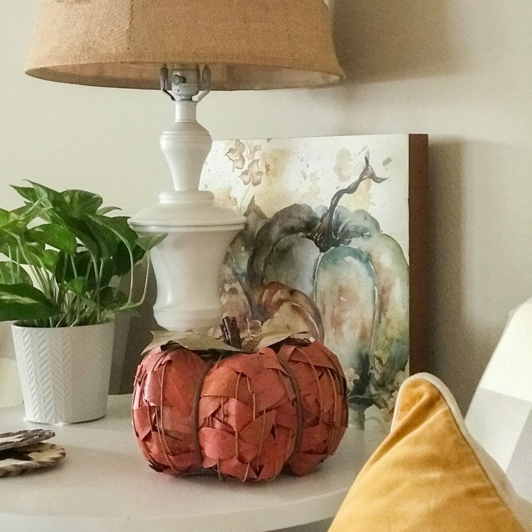 lamp with pumpkin picture, pumpkin and plant