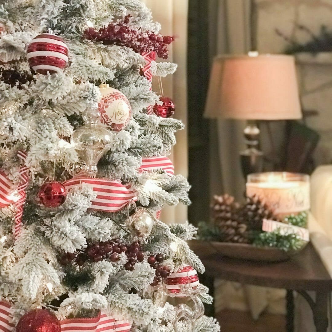 Close up of Peppermint striped Christmas tree with sofa table