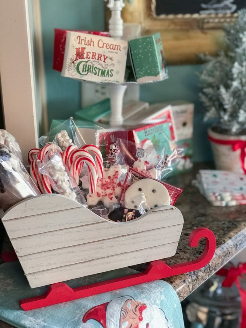 wooden sleigh filled with cocoa bar sweets