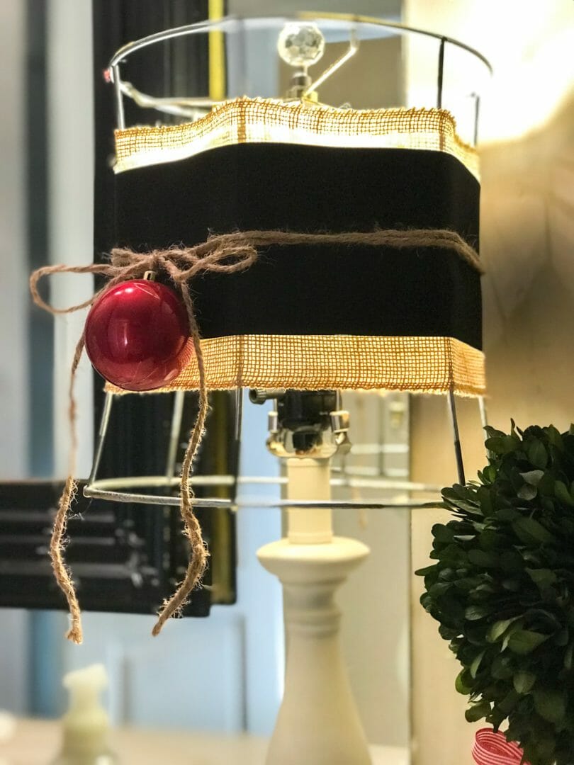 lamp with ribbon and red ornament