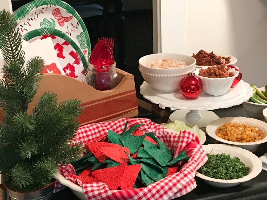 bowls of chips and sleigh with paper goods