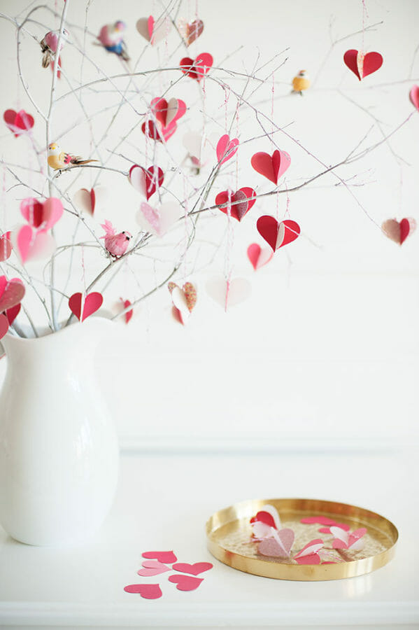 white pitcher with branches and hearts