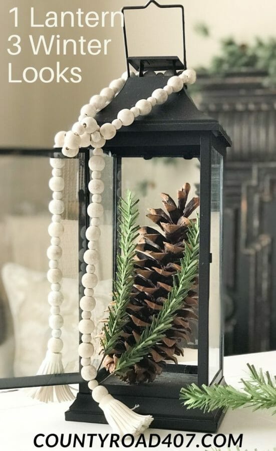Winter lantern with pine cone and bead garland