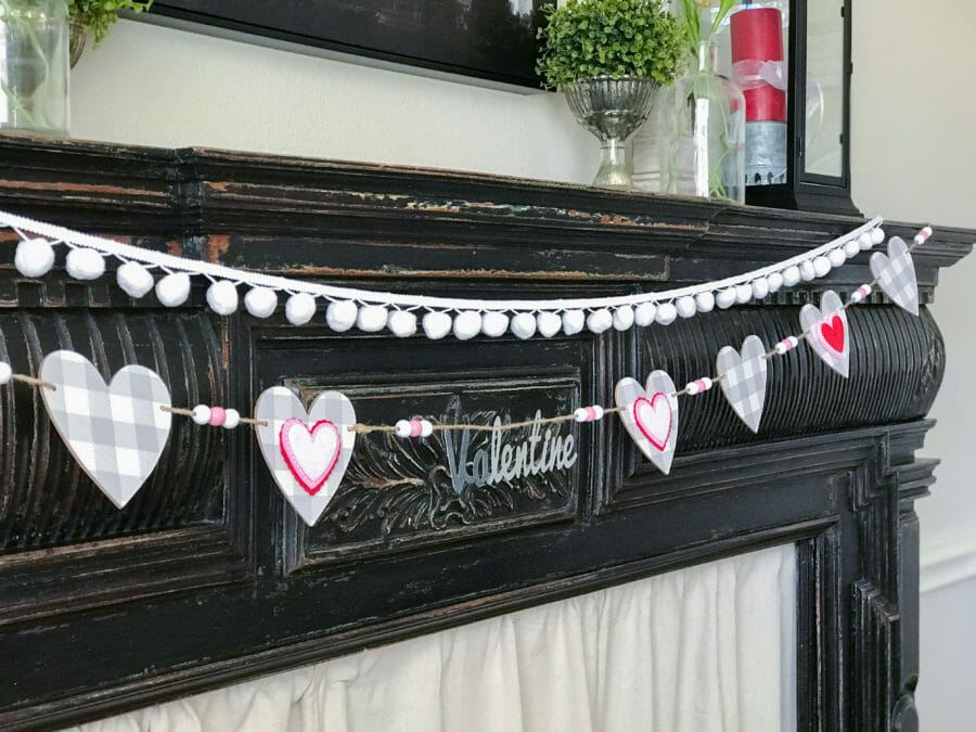 half mantel with garland and pom poms