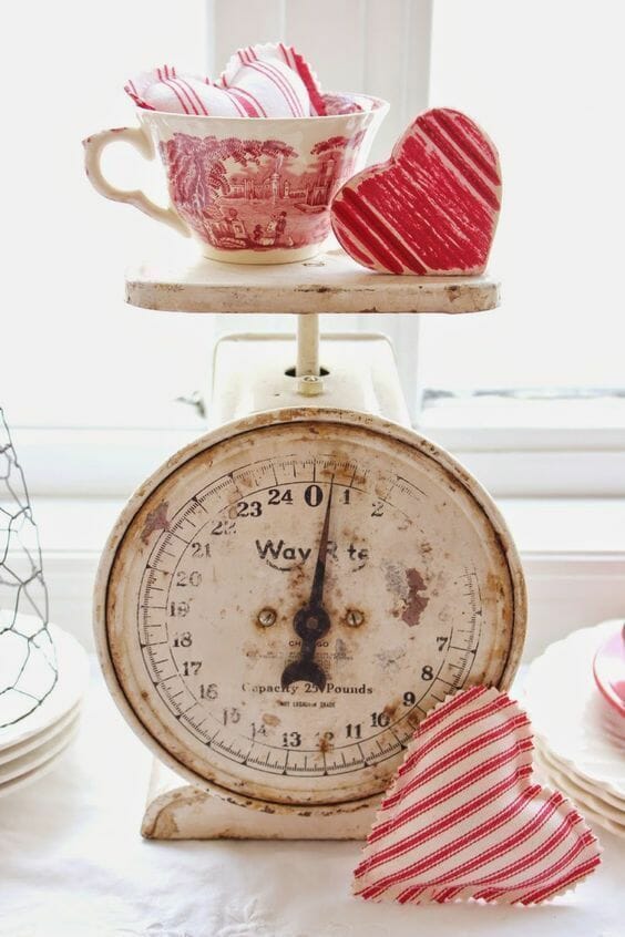 vintage scale with hearts and teacup