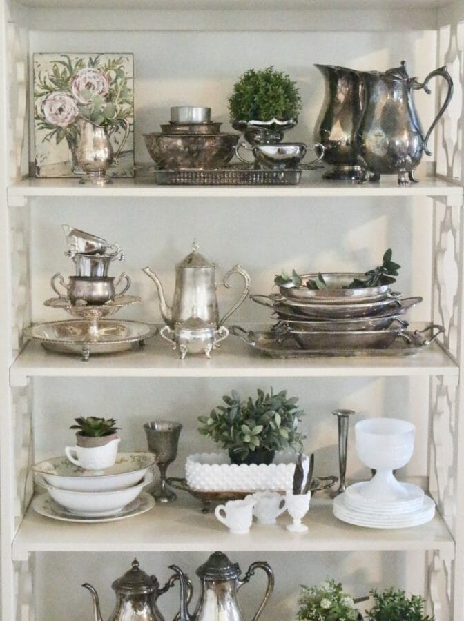 vintage silver collection on shelves