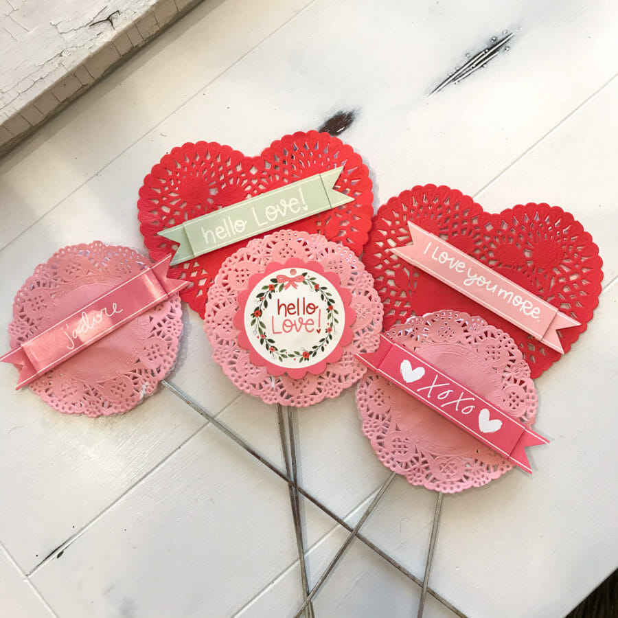 finished Valentine Skewers with doilies and paper messages