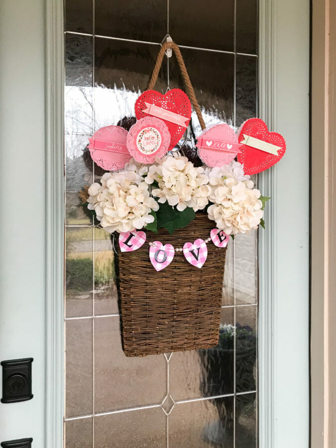 hanging basket with valentine picks and flowers