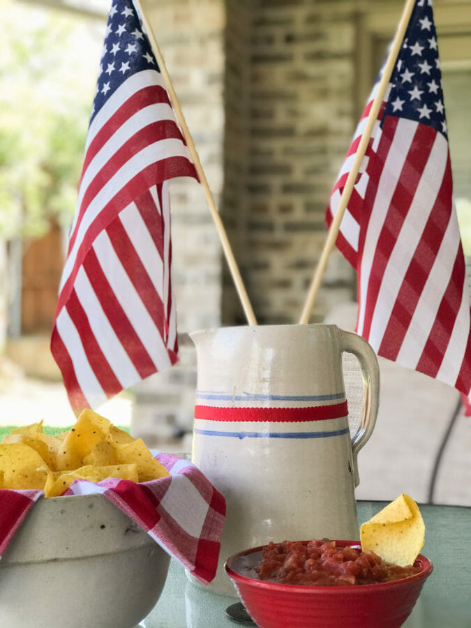 vintage pitcher with flags , chip and dip