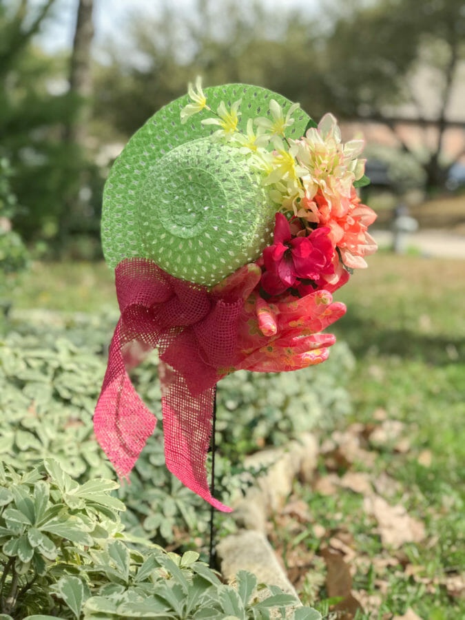 hat wreath on garden stake