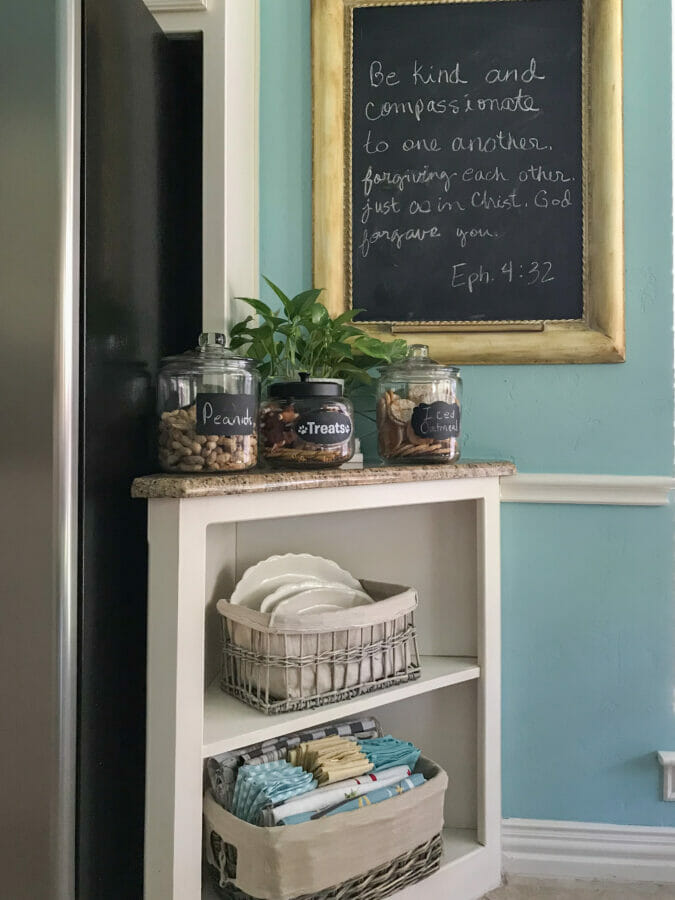 Snack corner with jars, chalkboard and baskets