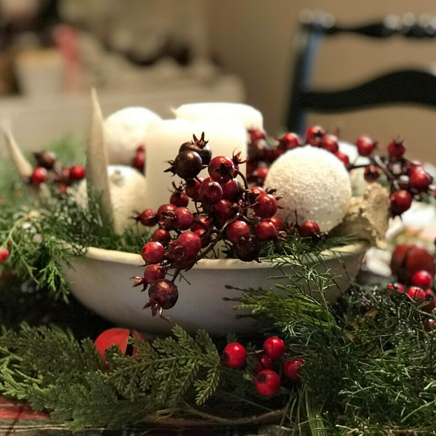 bowl of candles and cranberries